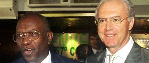 Warner (l.), Beckenbauer.
