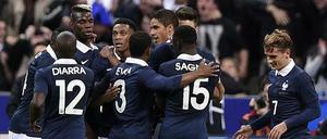 Symbol der Widerstandskraft. Die französische Mannschaft, hier beim Jubel nach dem 1:0-Führungstreffer von Olivier Giroud gegen Deutschland.