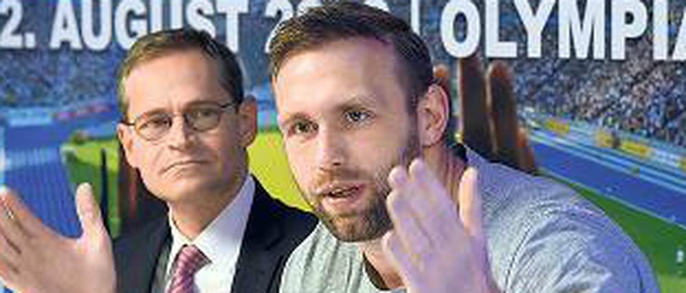 Ernster Blick. Robert Harting (r.) und Michael Müller sehen Probleme – aber auch Hoffnung. 
