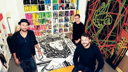 Kunst oder Kommerz? Die Tape Artists der Klebebande: Kolja Bultmann, Bodo Höbing und Bruno Kolberg (v.l.).