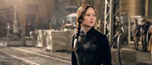 Scharfschützin. Katniss Everdeen (Jennifer Lawrence) führt die Rebellion an.