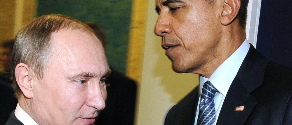 Russlands Präsident Vladimir Putin und US Präsident Barack Obama am Rande der UN-Klimakonferenz in Paris.