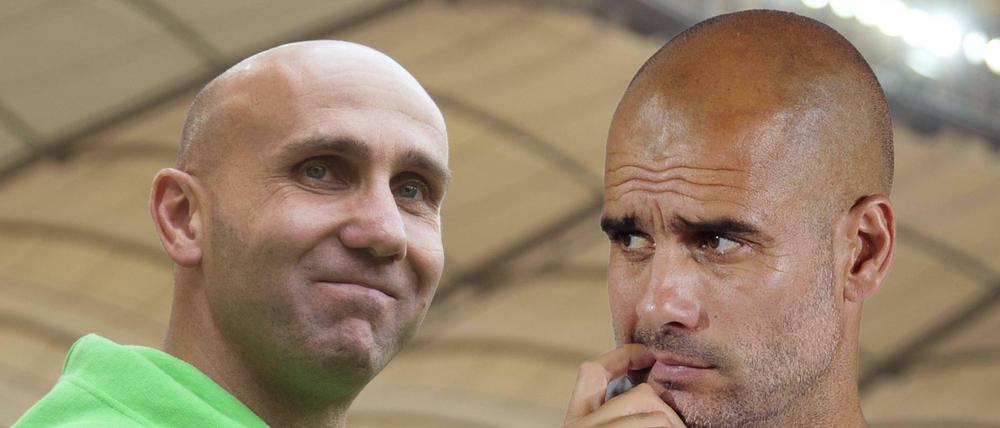 Die beiden Trainer Andre Schubert (l.) und Pep Guardiola treffen am Samstag erstmals aufeinander.
