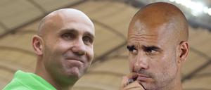 Die beiden Trainer Andre Schubert (l.) und Pep Guardiola treffen am Samstag erstmals aufeinander.