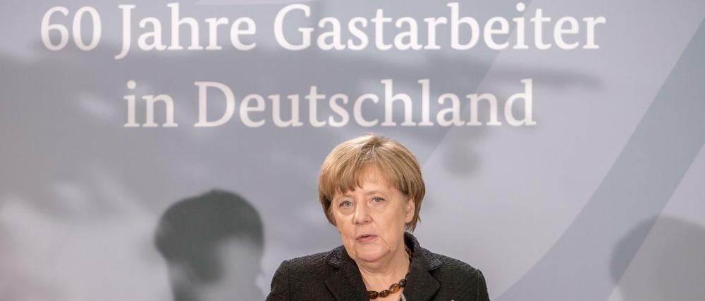 Bundeskanzlerin Angela Merkel (CDU) spricht bei der Veranstaltung "60 Jahre Gastarbeiter in Deutschland".