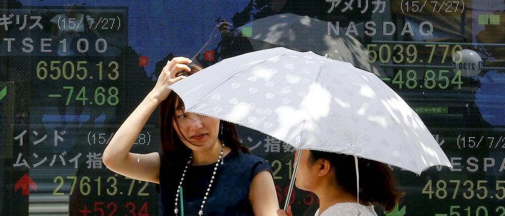 Die Börse in Tokio reagierte verhalten auf die Wachstumsprognosen der Regierung.