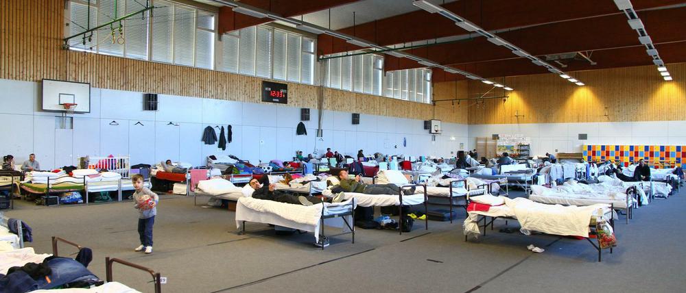 Flüchtlinge in der Turnhalle der FU in Dahlem.