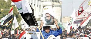 Proteste gegen die Hinrichtung eines Geistlichen durch Saudi-Arabien in Bagdad. 
