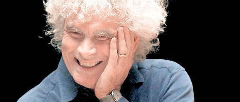 Auftakt. Sir Simon hat mit seinem künftigen Ensemble, dem London Symphony Orchestra, eine Schumann-Aufnahme eingespielt. Foto: dpa