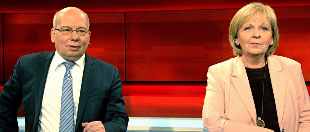 NRW-Ministerpräsidentin Hannelore Kraft (SPD) und Rainer Wendt, Bundesvorsitzender der Deutschen Polizeigewerkschaft, diskutieren im ARD-Talk "Hart aber fair" über Ursachen und Konsequenzen der Ereignisse von Köln.
