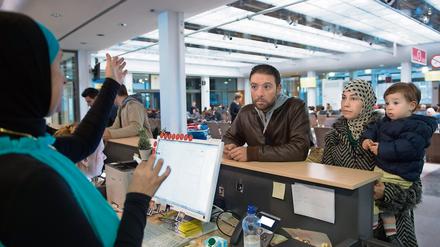 Flüchtlinge aus Syrien bei der Registrierung in Berlin. 