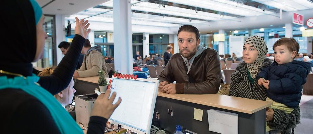 Flüchtlinge aus Syrien bei der Registrierung in Berlin.