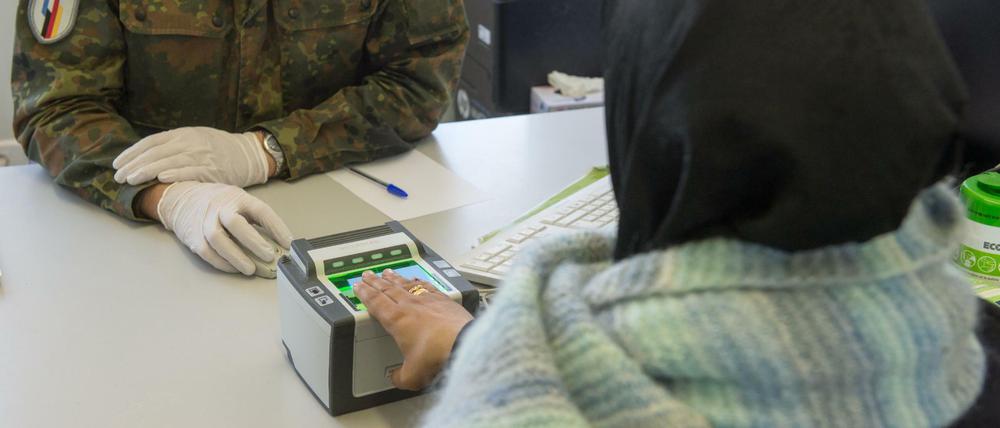 Registrierung einer Asylsuchenden aus Syrien in Bayern.