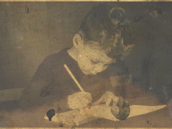 The great British painter Frank Auerbach as a child, drawing in his hometown Berlin., around 1935
