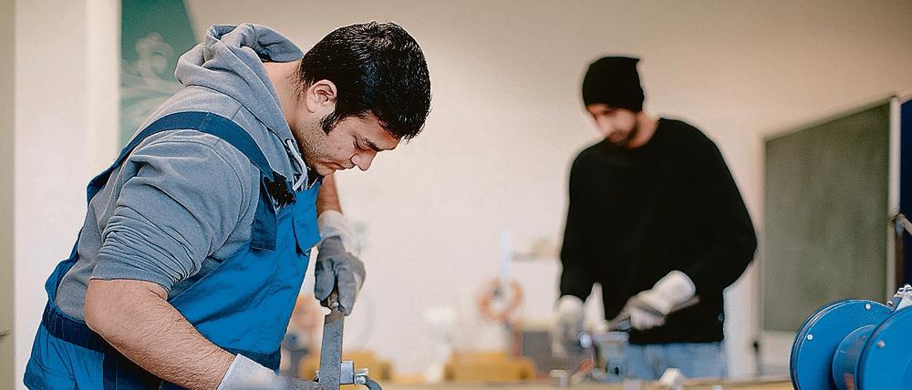 Flüchtlinge beim Probearbeiten
