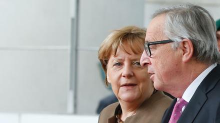 Bundeskanzlerin Angela Merkel (links) mit Jean-Claude Juncker, dem Chef der EU-Kommission