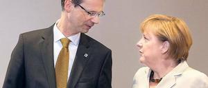 Die Chefin und ihr Helfer. Uwe Corsepius hat für Kanzlerin Angela Merkel den EU-Gipfel vorbereitet. 