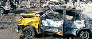 Verheerende Sprengkraft: Zwei Bomben haben in der Stadt Homs mindestens 57 Menschen getötet.