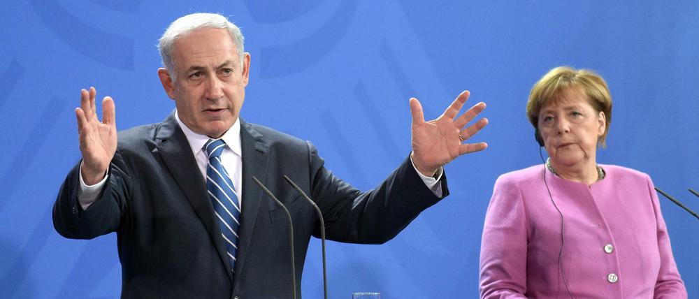 Israels Ministerpräsident Benjamin Netanyahu und Bundeskanzlerin Angela Merkel bei ihrer gemeinsamen Pressekonferenz am Dienstag in Berlin.