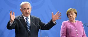 Israels Ministerpräsident Benjamin Netanyahu und Bundeskanzlerin Angela Merkel bei ihrer gemeinsamen Pressekonferenz am Dienstag in Berlin.