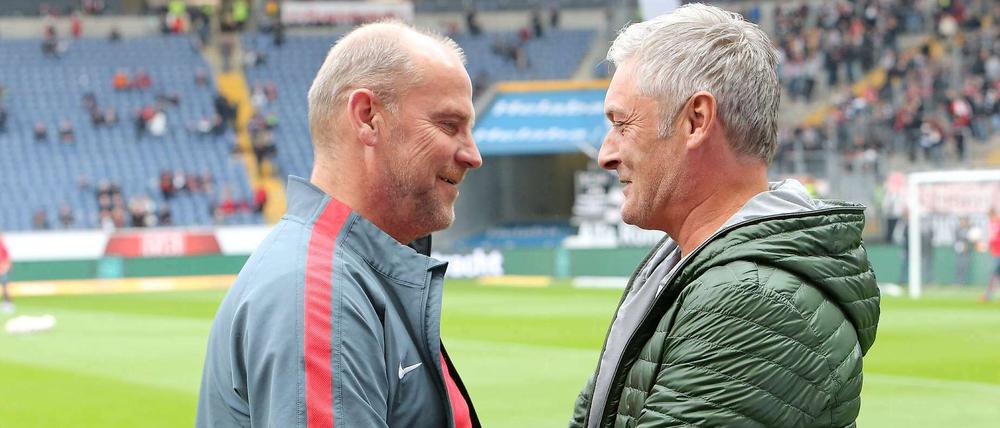 Woll'n wir tauschen? Ach nee, lass mal. Thomas Schaaf und Armin Veh haben gerade Probleme im Abstiegskampf.