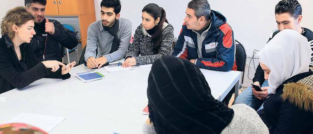 Deutschstunde. Syrische Flüchtlinge besuchen einen Integrationskurs.