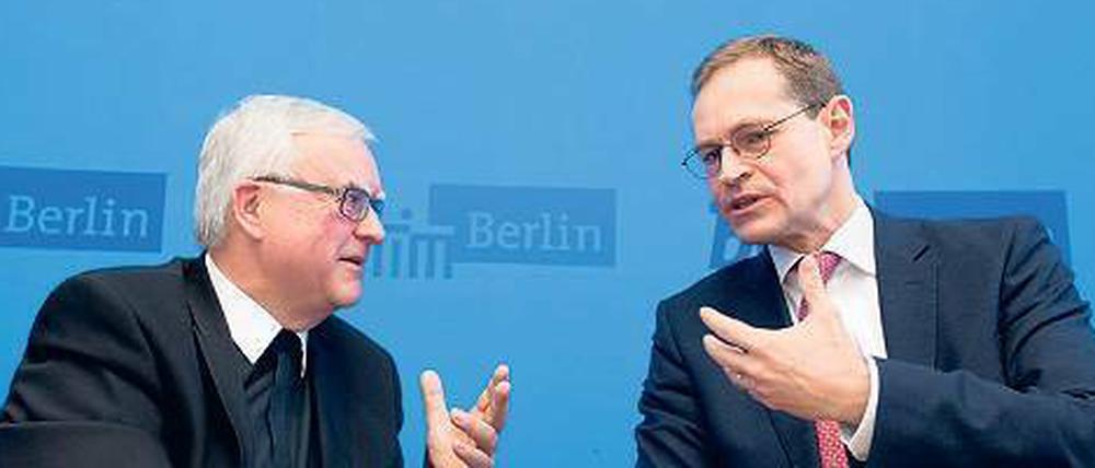 Werben um Aufmerksamkeit. Bischof Koch (links) und Senatschef Müller.