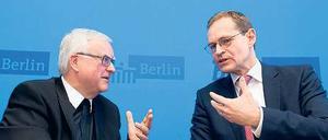 Werben um Aufmerksamkeit. Bischof Koch (links) und Senatschef Müller.