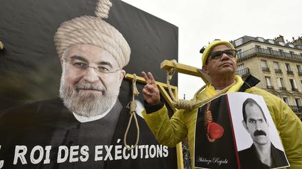 Vor einem Besuch des iranischen Präsidenten Hassan Rouhani im Januar in Paris protestierten Demonstranten gegen die Todesstrafe im Iran. 