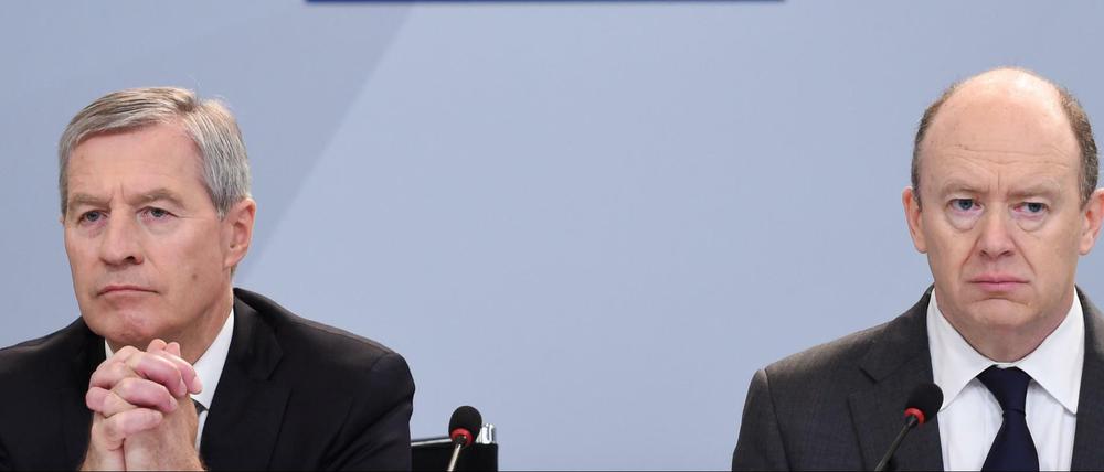 Was die Deutsche Bank ihren Chefs zahlt: 3,8 Millionen Euro für Jürgen Fitschen (links), 1,9 Millionen Euro für John Cryan.