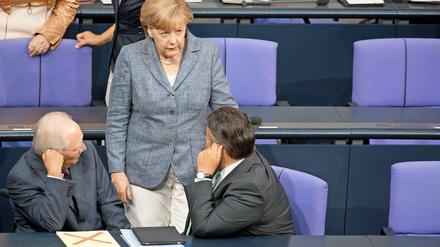 Wolfgang Schäuble, Angela Merkel, Sigmar Gabriel.