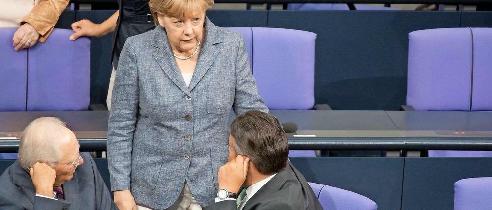Wolfgang Schäuble, Angela Merkel, Sigmar Gabriel.