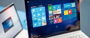 Die Tablets der neuen Generation – wie das Surface Book von Microsoft (großes Bild), das Huawei Matebook und das Samsung Galaxy TabPro S – lassen sich mit Tastatur und Touchpad verbinden – und laufen mit einem ganz normalen Windows. Fotos: dpa (2), Promo