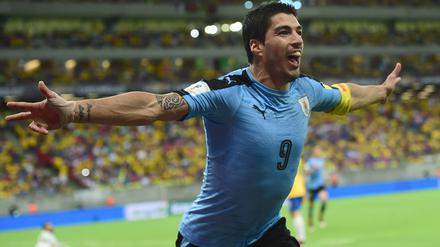 Ich bin wieder da, und wie! Luis Suarez feiert sein Tor gegen Brasilien.