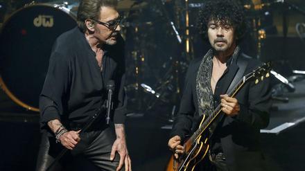 Das Konzert von Johnny Hallyday (links, hier bei einem Auftritt in Barcelona) fand unter hohen Sicherheitsvorkehrungen statt.