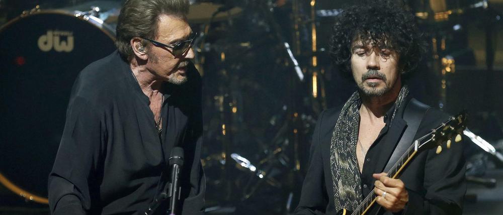 Das Konzert von Johnny Hallyday (links, hier bei einem Auftritt in Barcelona) fand unter hohen Sicherheitsvorkehrungen statt.