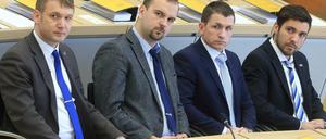 André Poggenburg, Daniel Roi, Matthias Büttner und Tobias Rausch (von links) sitzen in der ersten Reihe der AfD-Fraktion des neuen Landtages im Plenarsaal in Magdeburg.