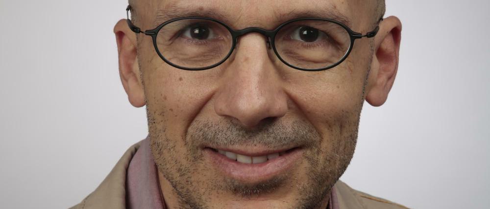 Christoph Benzmüller lässt Studierende nach Gott suchen. Dafür bekam er jetzt den Lehrpreis der FU.