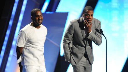 Kanye West (links) ist am Musikdienst von Jay-Z beteiligt.