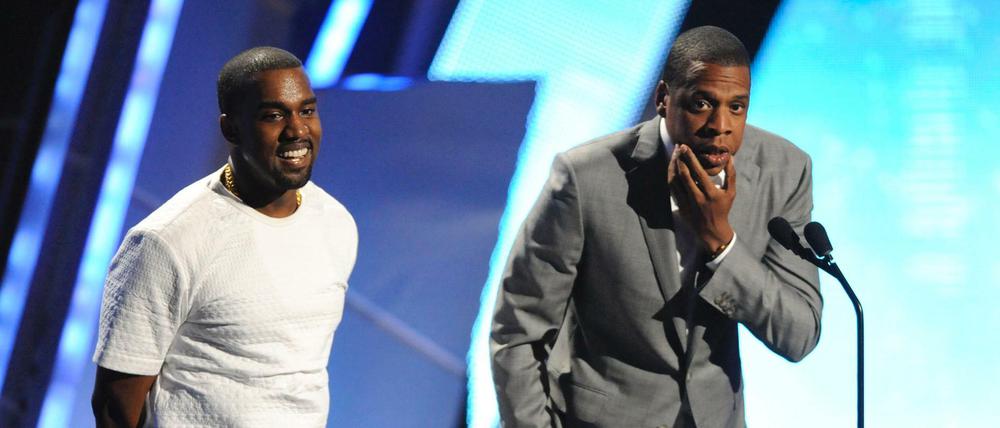 Kanye West (links) ist am Musikdienst von Jay-Z beteiligt.
