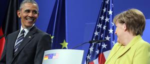 Barack Obama und Angela Merkel geben eine Pressekonferenz in Hannover. 