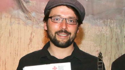 Ausgezeichnet. Tagesspiegel-Autor Karl Grünberg mit dem DRK-Medienpreis.