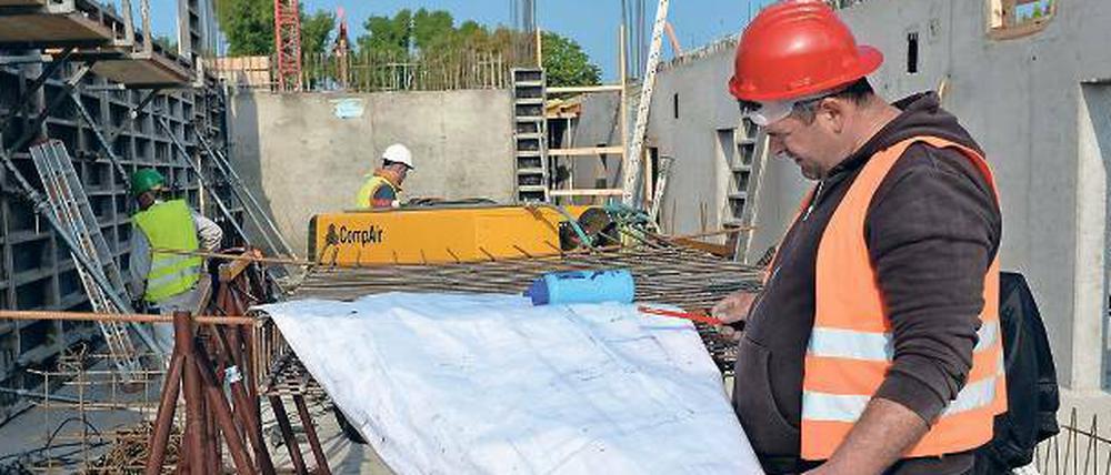 Gefragt. Die Auftragsbücher von Berlins Bauunternehmen sind gut gefüllt. Foto: dpa