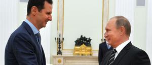 Zwei vermeintlich starke Männer unter sich: Baschar Al-Assad und Wladimir Putin (rechts).