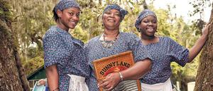 Gut drauf. Diese drei Gullah-Folksängerinnen warten auf ihren Auftritt beim Kulturfestival auf Sapelo Island. 