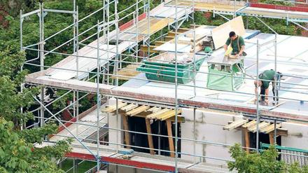 Hochkonjunktur. Deutschlands Bauindustrie rechnet 2016 mit Wachstum – und will neue Mitarbeiter einstellen. Foto: Bodo Marks/dpa