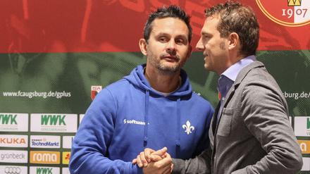 Dirk Schuster (l.) beerbt Markus Weinzierl beim FC Ausgburg. 