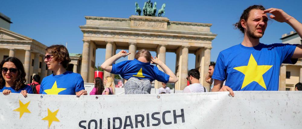 Aktivisten vor dem Brandenburger Tor.