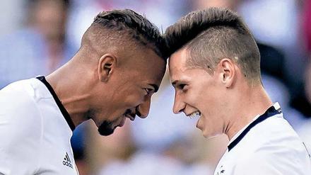 Kopfgeburt. Das 3:0 im Achtelfinale hat das deutsche Team vor allem den Torschützen Boateng (links) und Draxler zu verdanken. 