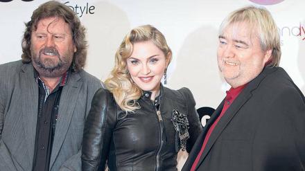 Mehr Engagement gewünscht: Die Vorstände der Jopp AG, Jürgen (58), links, und Ralf (55), 2013 mit Madonna in Zehlendorf. 